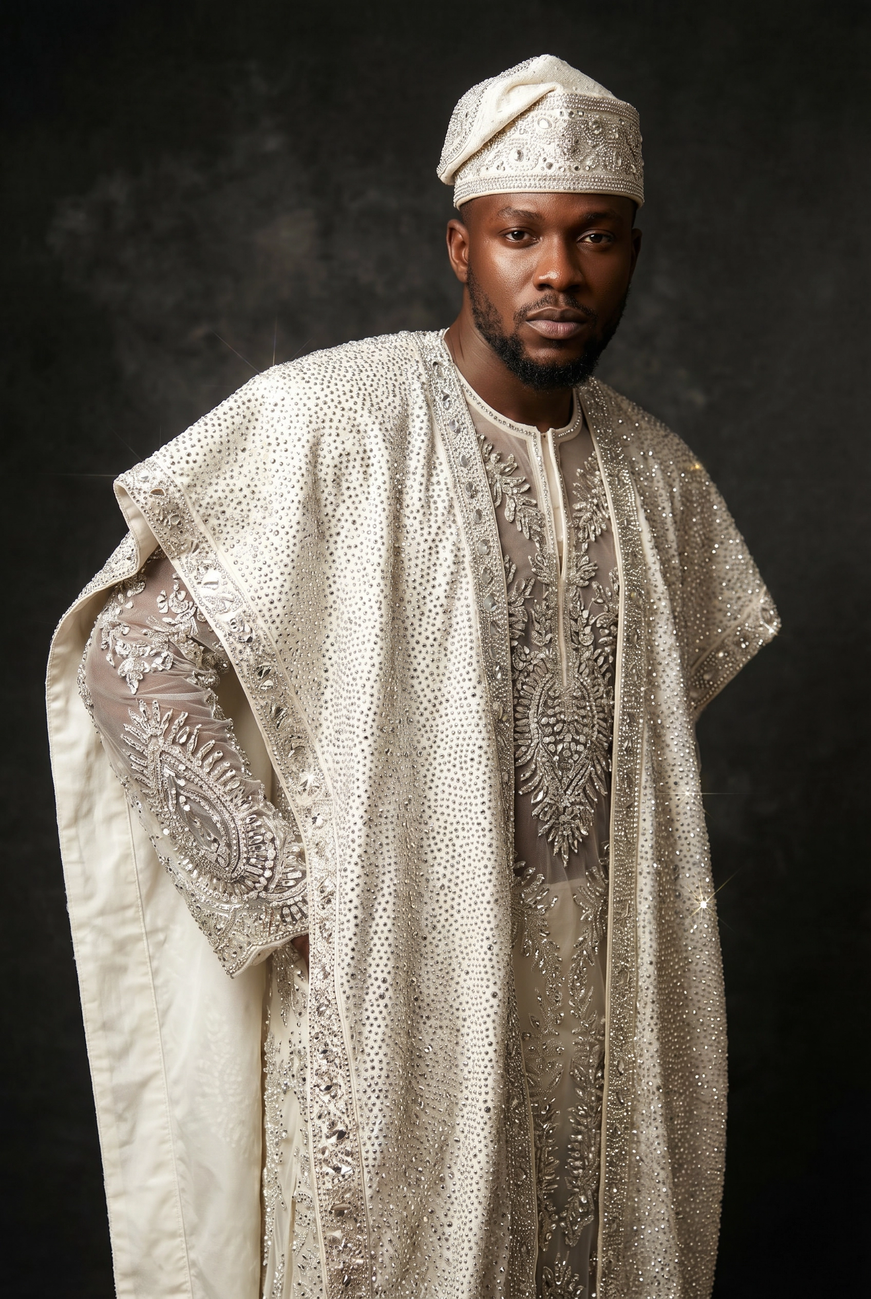 White crystal-beaded agbada with silver embroidery and matching fila
